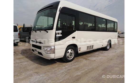 Acheter Import Voiture Toyota Coaster Blanc à Import - Dubai, Clarendon Acheter Import Voiture Toyota Coaster Blanc à Import - Dubai, Clarendon