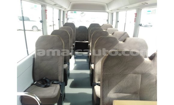 Acheter Import Voiture Toyota Coaster Blanc à Import - Dubai, Clarendon Acheter Import Voiture Toyota Coaster Blanc à Import - Dubai, Clarendon