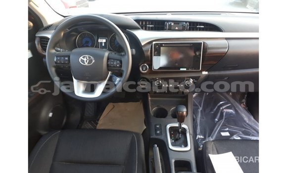 Buy Import Toyota Hilux Red Car in Import - Dubai in Clarendon Buy Import Toyota Hilux Red Car in Import - Dubai in Clarendon