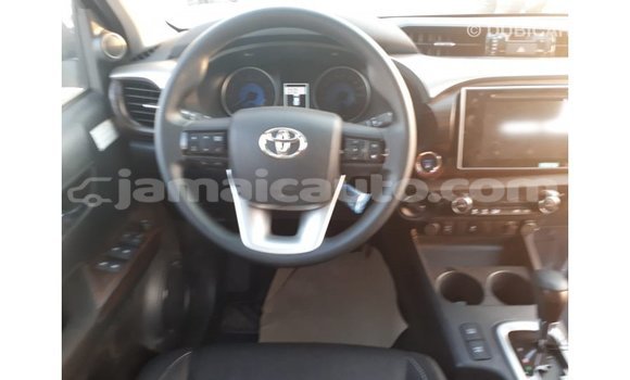 Buy Import Toyota Hilux Red Car in Import - Dubai in Clarendon Buy Import Toyota Hilux Red Car in Import - Dubai in Clarendon