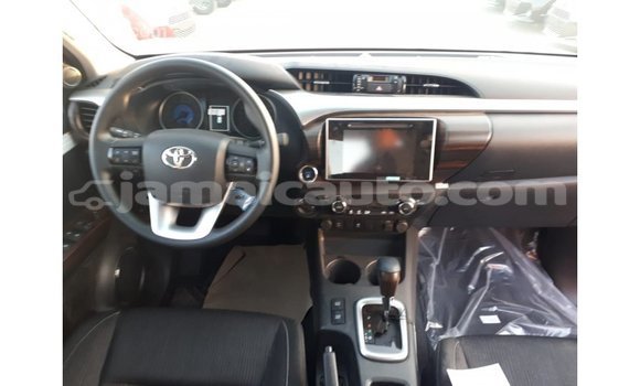 Buy Import Toyota Hilux Red Car in Import - Dubai in Clarendon Buy Import Toyota Hilux Red Car in Import - Dubai in Clarendon