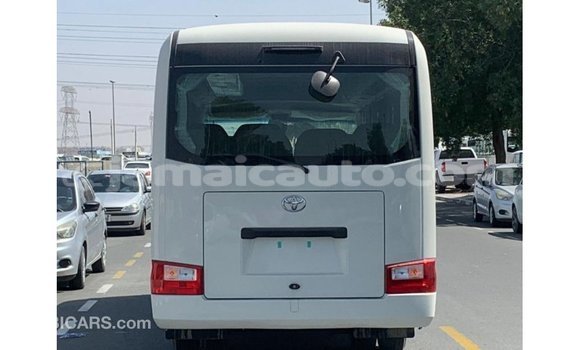 Acheter Import Voiture Toyota Coaster Blanc à Import - Dubai, Clarendon Acheter Import Voiture Toyota Coaster Blanc à Import - Dubai, Clarendon