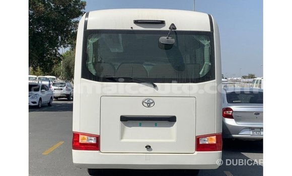 Acheter Import Voiture Toyota Coaster Blanc à Import - Dubai, Clarendon Acheter Import Voiture Toyota Coaster Blanc à Import - Dubai, Clarendon