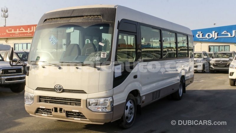 Big with watermark toyota coaster clarendon import dubai 2661