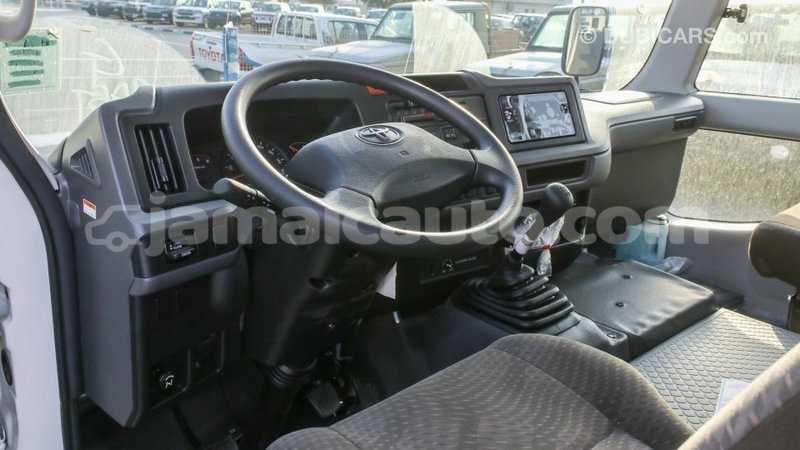 Big with watermark toyota coaster clarendon import dubai 2661