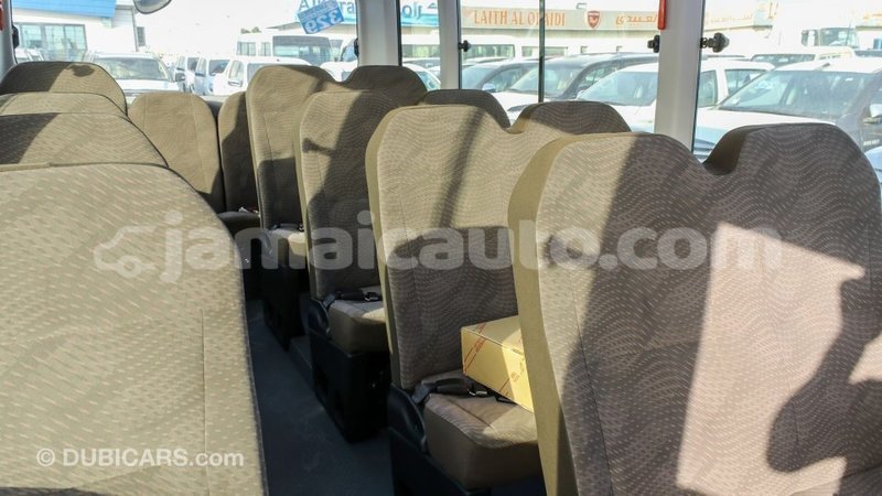 Big with watermark toyota coaster clarendon import dubai 2661
