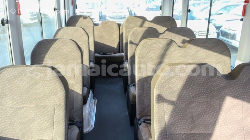Big with watermark toyota coaster clarendon import dubai 2661