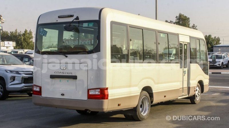 Big with watermark toyota coaster clarendon import dubai 2661