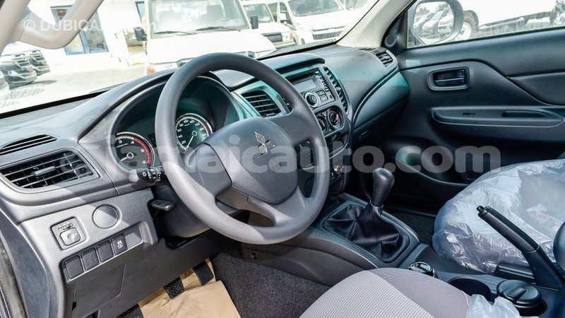 Big with watermark mitsubishi l200 clarendon import dubai 2772