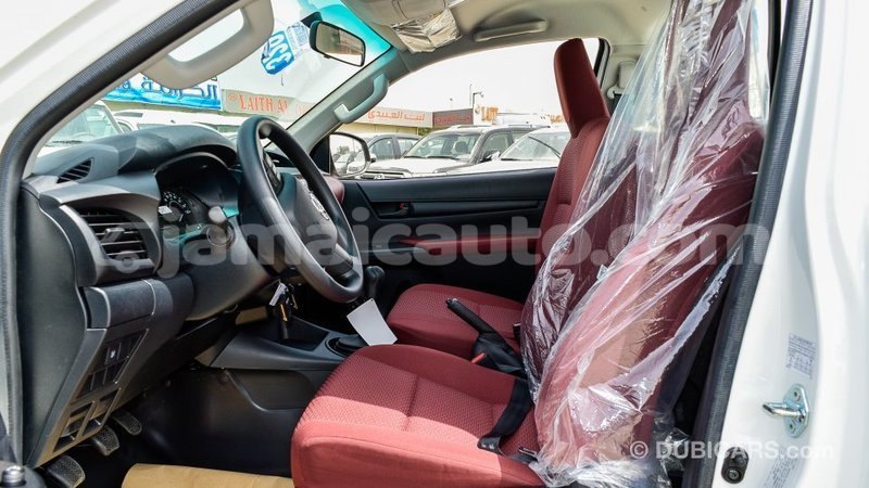 Big with watermark toyota hilux clarendon import dubai 2773