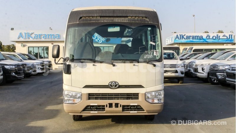Big with watermark toyota coaster clarendon import dubai 2801