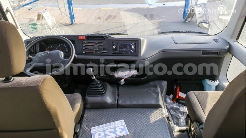 Big with watermark toyota coaster clarendon import dubai 2801