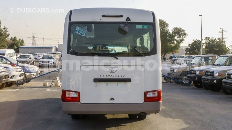 Big with watermark toyota coaster clarendon import dubai 2801