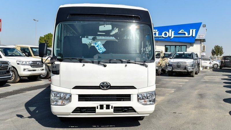 Big with watermark toyota coaster clarendon import dubai 2866