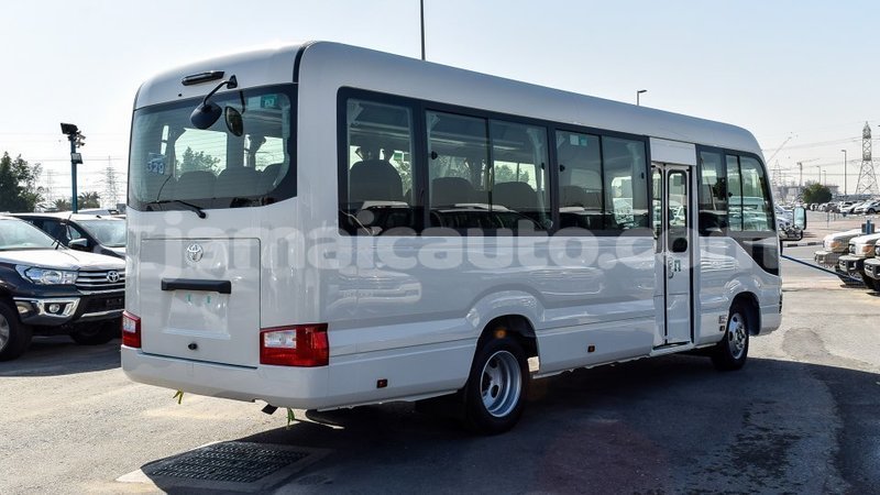 Big with watermark toyota coaster clarendon import dubai 2866
