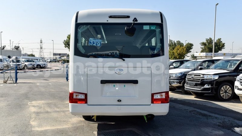 Big with watermark toyota coaster clarendon import dubai 2866