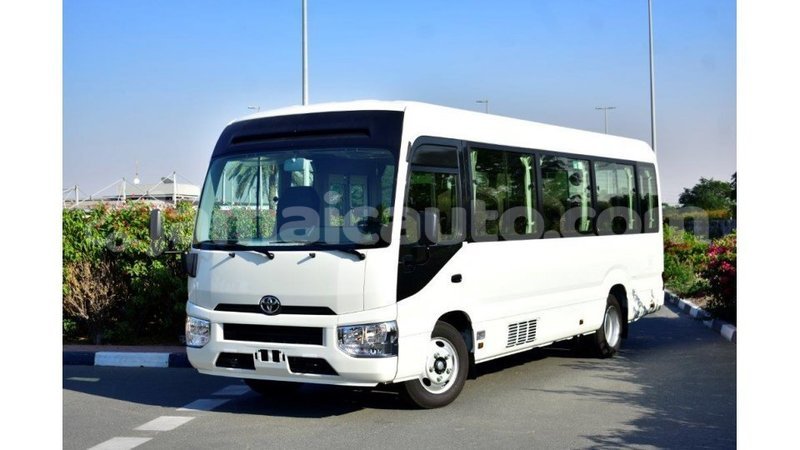 Big with watermark toyota coaster clarendon import dubai 2964