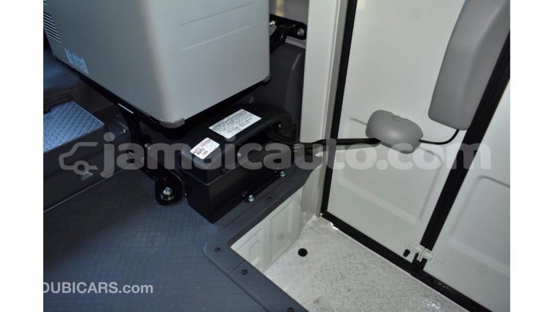 Big with watermark toyota coaster clarendon import dubai 2964