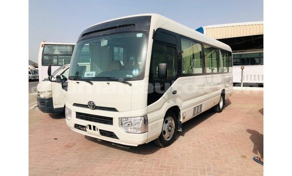 Acheter Import Voiture Toyota Coaster Blanc à Import - Dubai, Clarendon Acheter Import Voiture Toyota Coaster Blanc à Import - Dubai, Clarendon