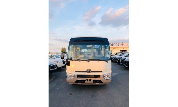Acheter Import Voiture Toyota Coaster Blanc à Import - Dubai, Clarendon Acheter Import Voiture Toyota Coaster Blanc à Import - Dubai, Clarendon