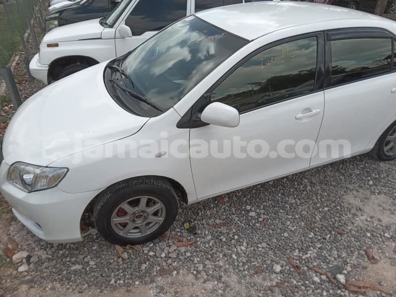 Big with watermark toyota axio clarendon import dubai 3859