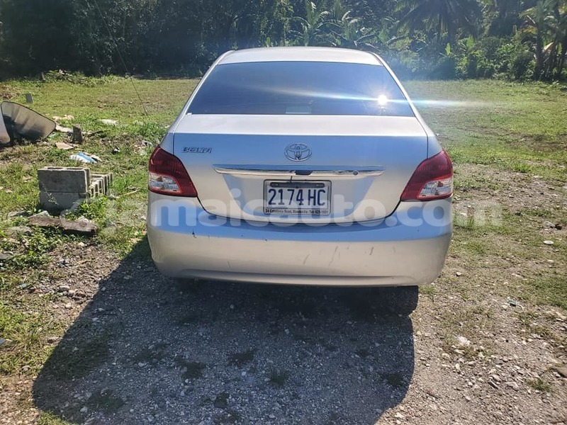 Big with watermark toyota belta manchester mandeville 4754