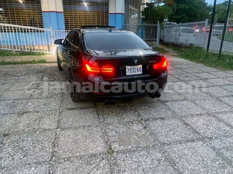 Big with watermark bmw 315 manchester mandeville 4989