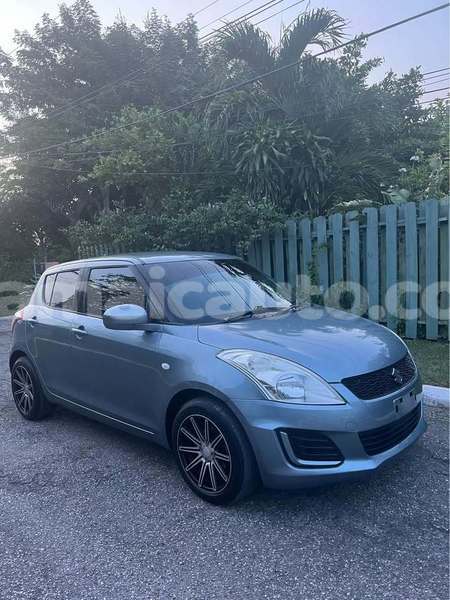 Big with watermark suzuki swift clarendon import dubai 5145