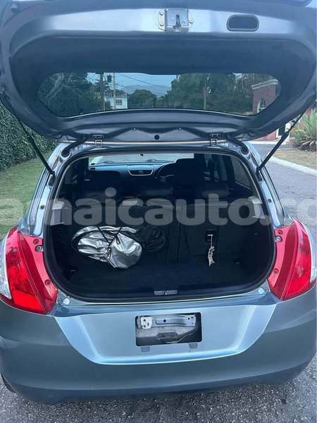 Big with watermark suzuki swift clarendon import dubai 5145