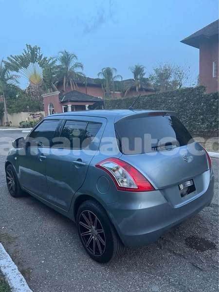 Big with watermark suzuki swift clarendon import dubai 5145