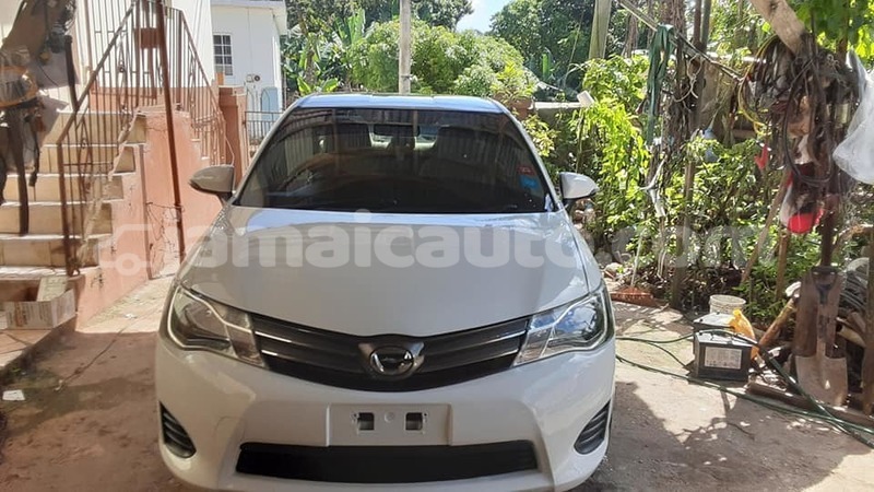 Big with watermark toyota axio clarendon import dubai 5304