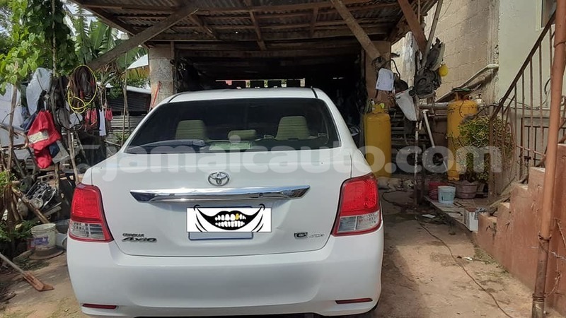 Big with watermark toyota axio clarendon import dubai 5304