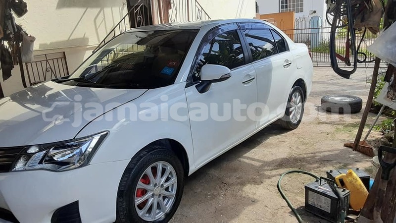 Big with watermark toyota axio clarendon import dubai 5304