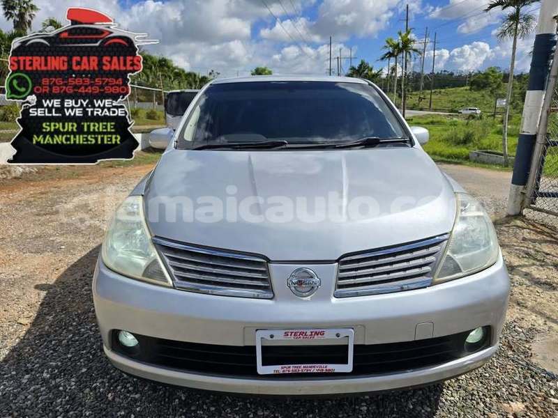 Big with watermark nissan tiida clarendon import dubai 5314