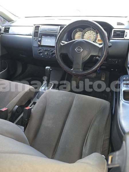 Big with watermark nissan tiida clarendon import dubai 5314