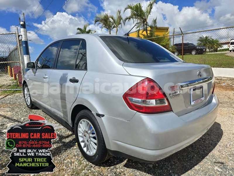 Big with watermark nissan tiida clarendon import dubai 5314