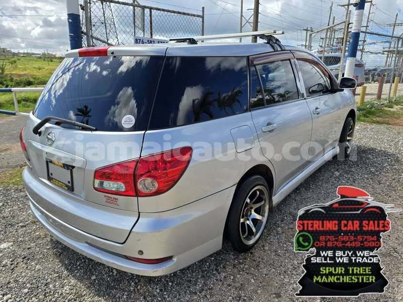 Big with watermark nissan wingroad clarendon import dubai 5326