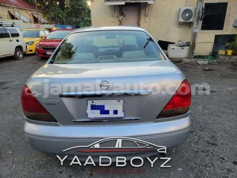 Big with watermark nissan 100nx trelawney albert town 5455