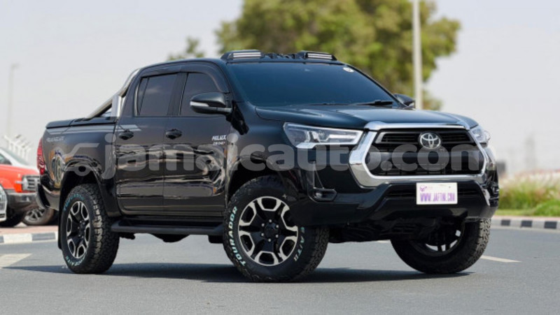 Big with watermark toyota hilux clarendon import dubai 5461