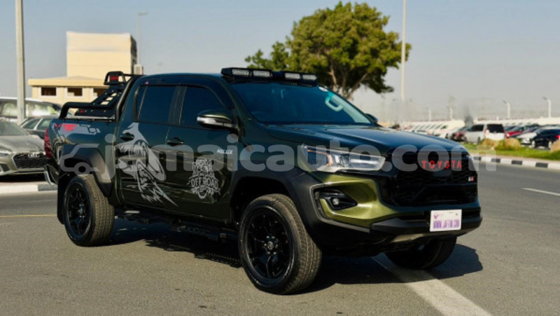 Big with watermark toyota hilux clarendon import dubai 5464