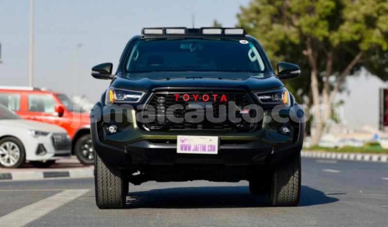 Big with watermark toyota hilux clarendon import dubai 5469