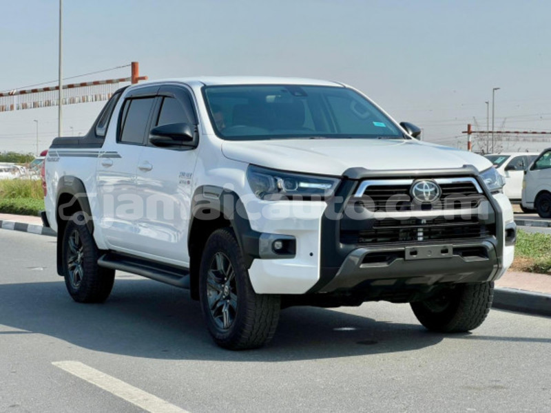 Big with watermark toyota hilux clarendon import dubai 5473