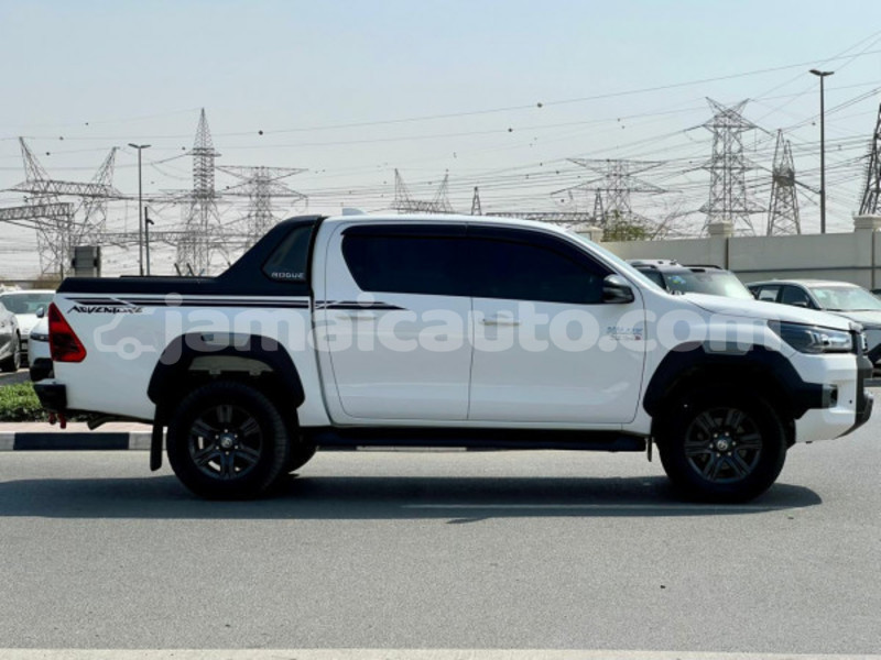 Big with watermark toyota hilux clarendon import dubai 5473