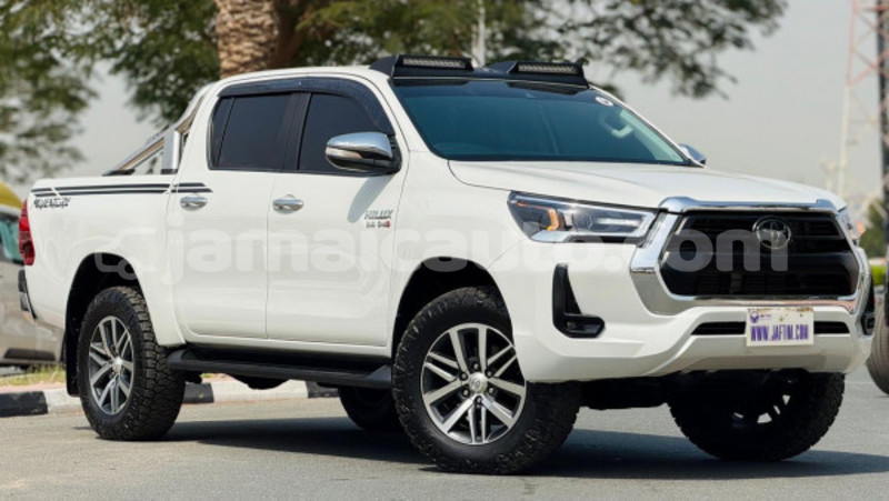 Big with watermark toyota hilux clarendon import dubai 5493