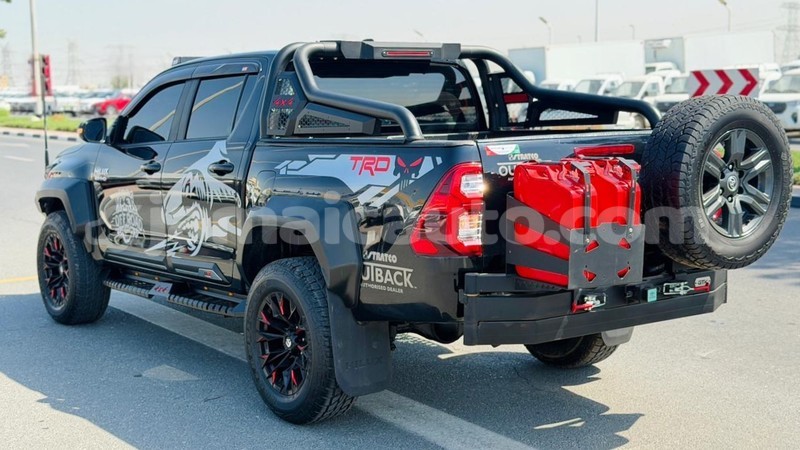 Big with watermark toyota hilux clarendon import dubai 5619