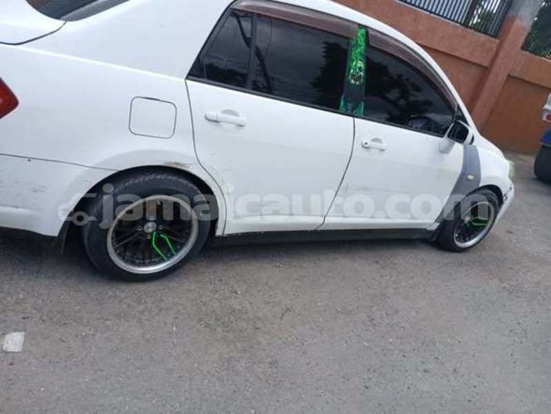 Big with watermark nissan tiida manchester mandeville 5793